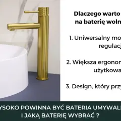 Złota bateria wolnostojąca nad białą umywalką nablatową. Odległość baterii od umywalki jest kluczowa dla komfortu.
