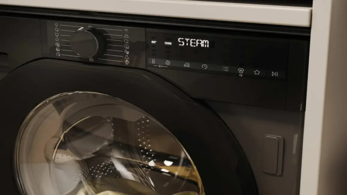 Nowoczesna pralka z panelem sterowania, na którym widnieje napis "STEAM". Czy pralka sama podgrzewa wodę? Tak, ta funkcja jest dostępna.